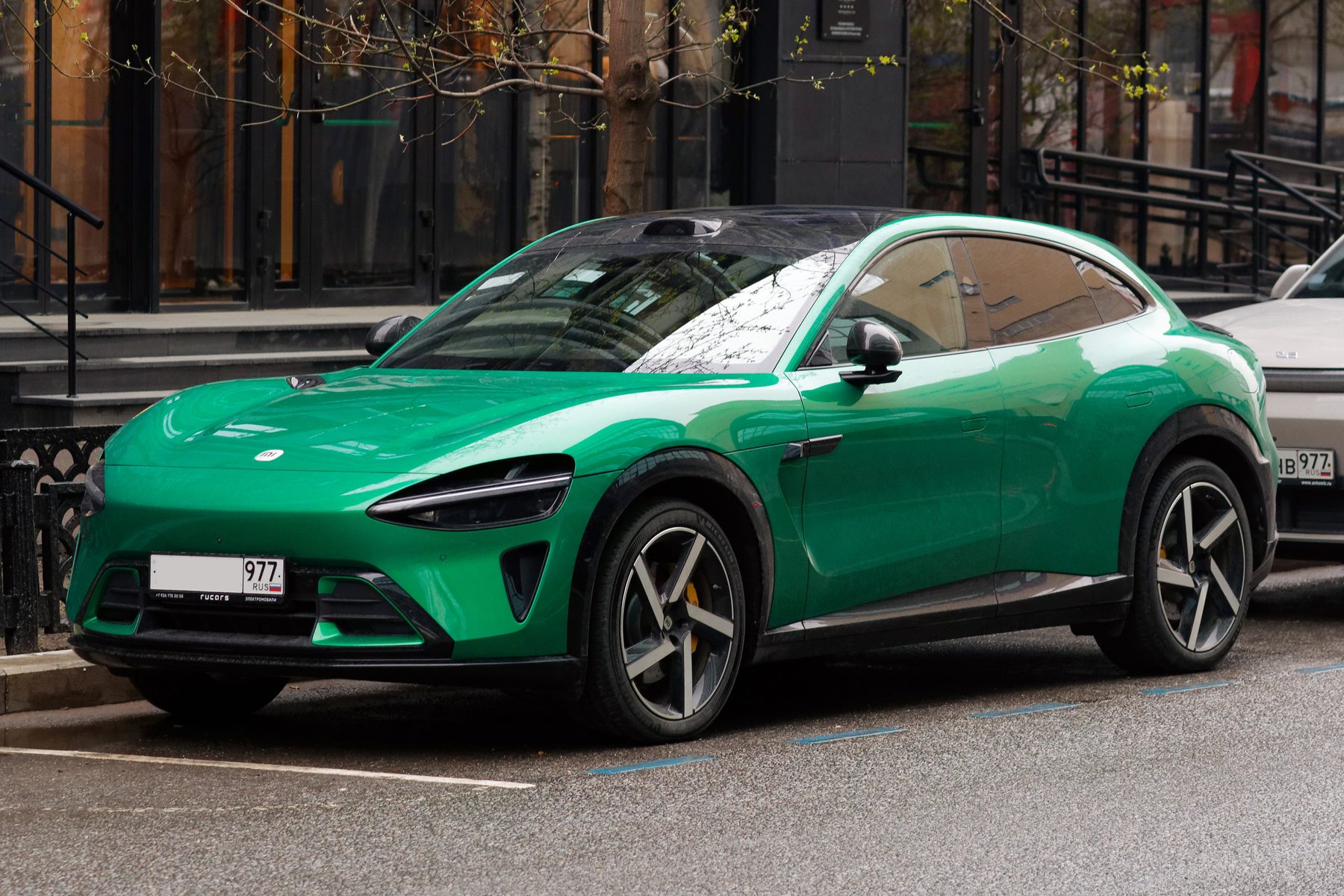 Green Xiaomi YU7 electric SUV, front three-quarter view